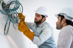 Electrician are working on building rewiring